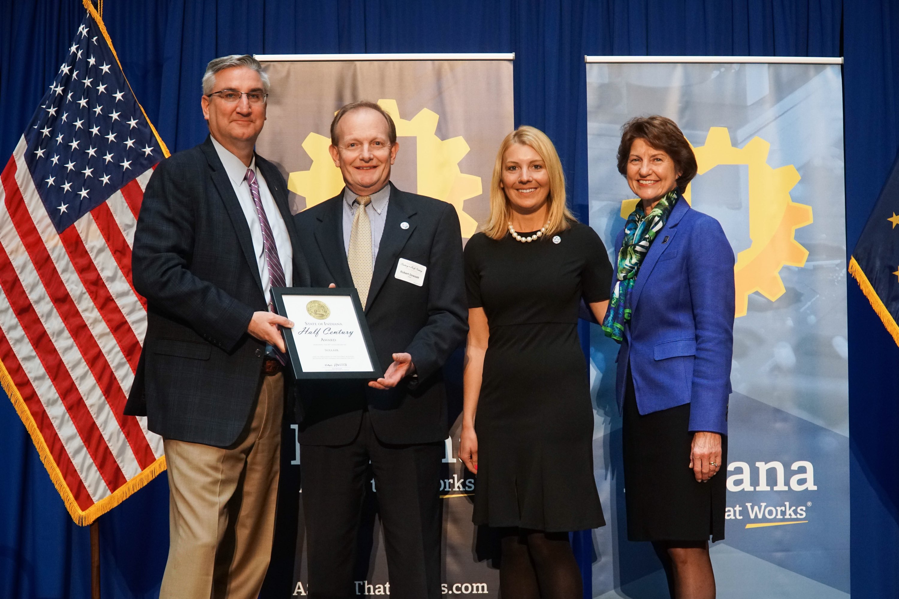 Sullair accepts Half Century Business Award from Indiana Governor Eric J. Holcomb