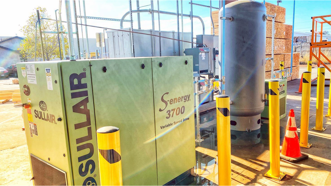 Sullair industrial air compressors in the sunlight