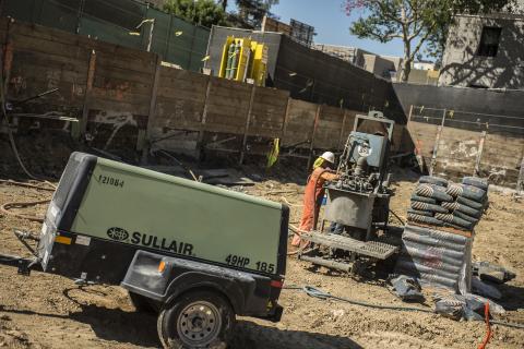 Sullair portable diesel air compressor on a jobsite