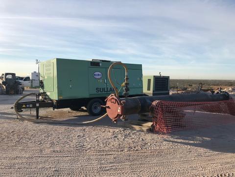 Sullair 900XHH/1150XH portable compressor performing pipeline pigging