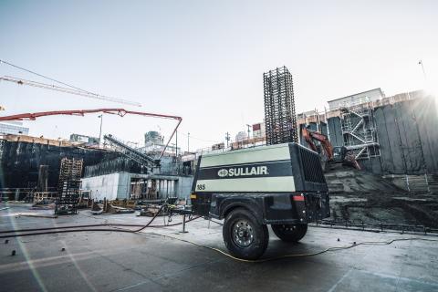 Sullair 185 cfm portable compressor on a jobsite in Seattle